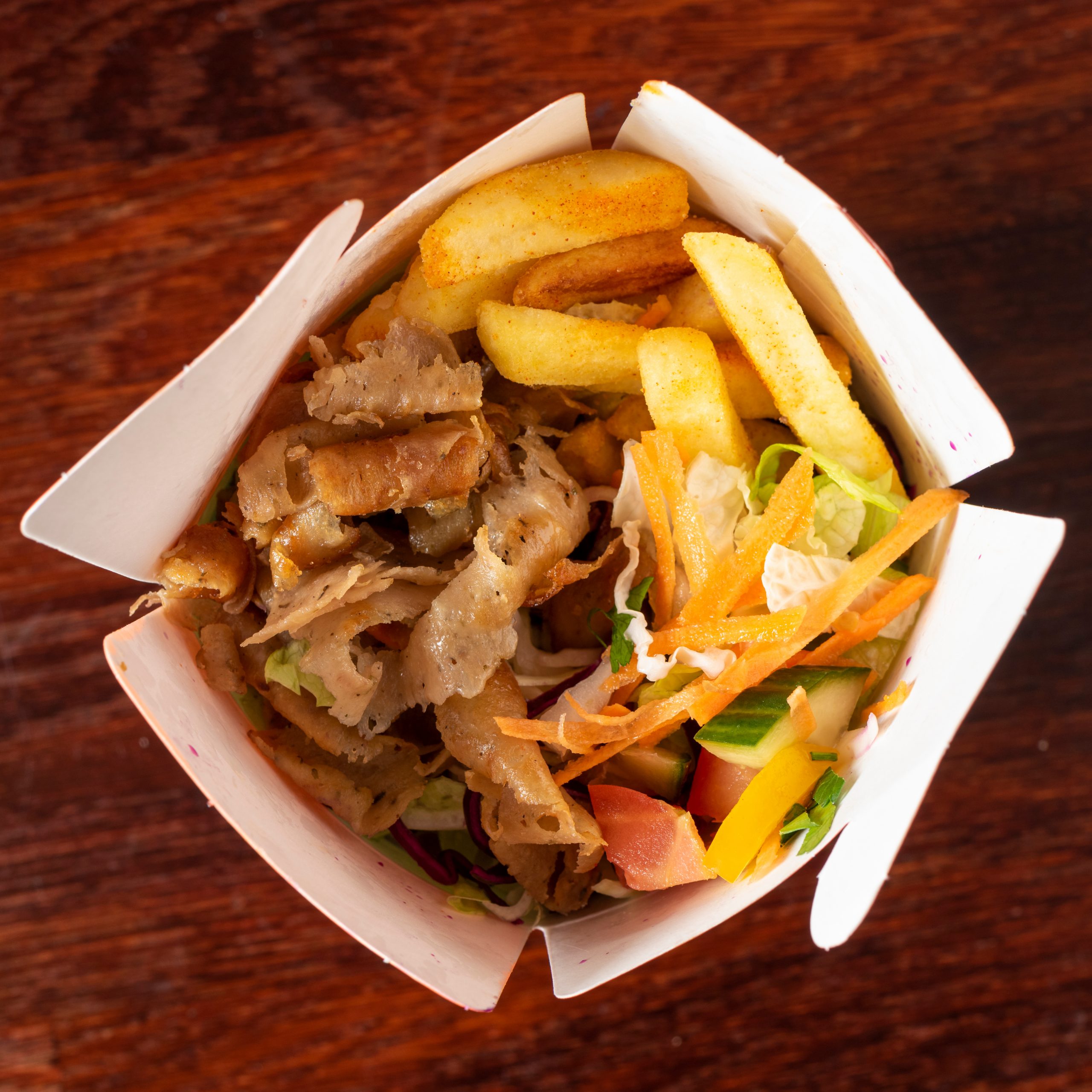 Turkish Kebab box with french fries isolated on white background.